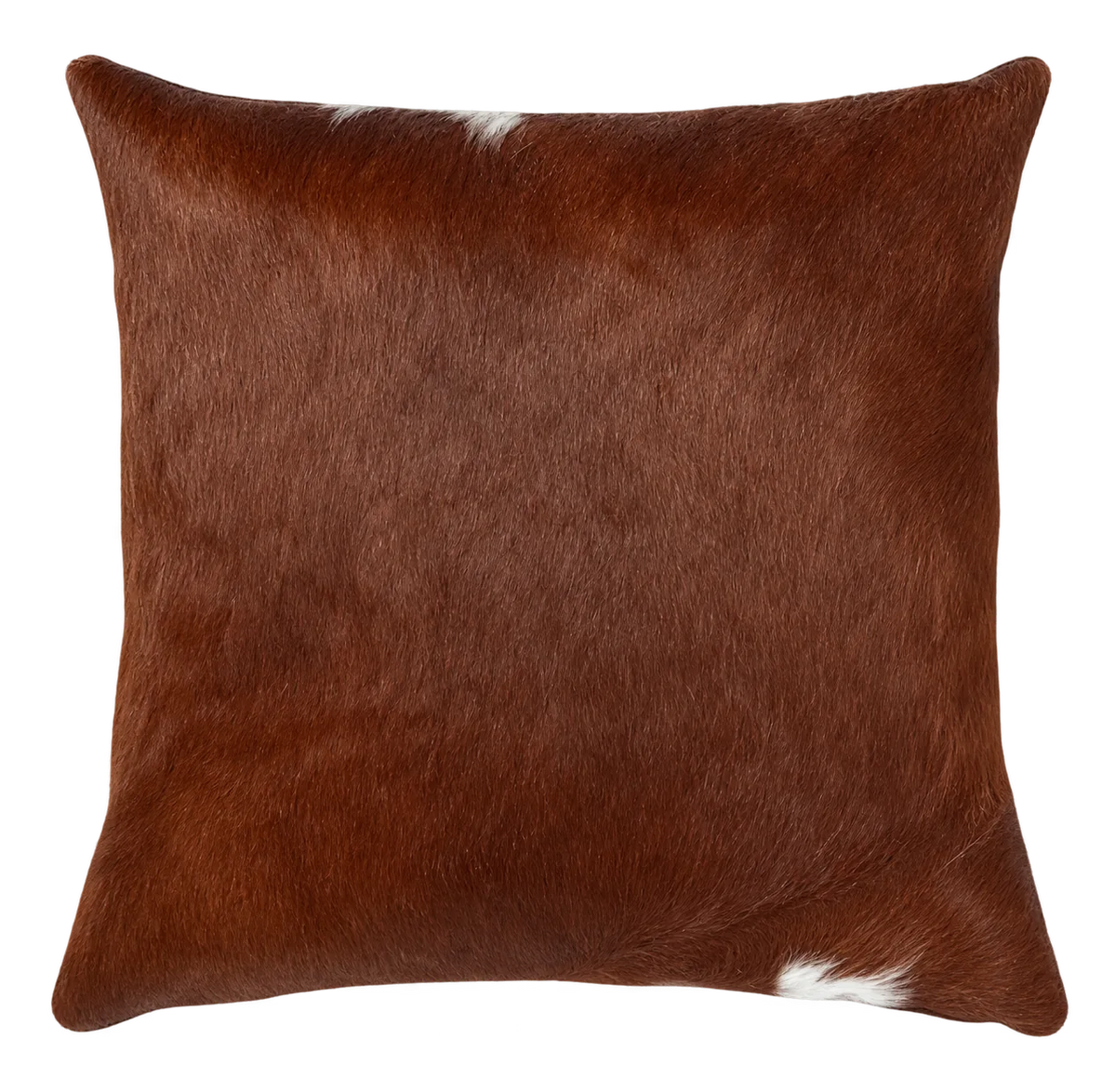 Coussin en peau de vache Cognac, vue du produit aux tonalités brun chaud