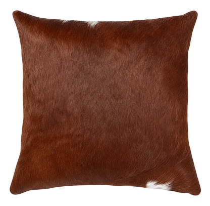Coussin en peau de vache Cognac, vue du produit aux tonalités brun chaud