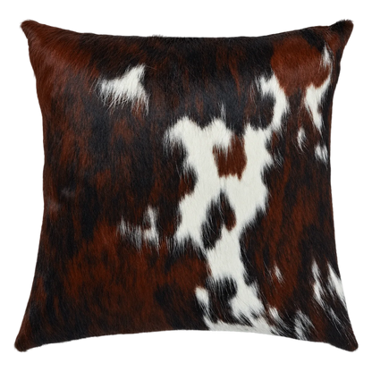Coussin en peau de vache Éclat blanc, vue du produit aux tonalités brun foncé et blanc