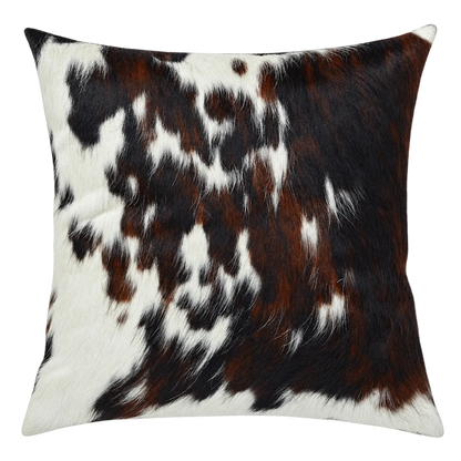 Coussin en peau de vache Mosaïque, vue du produit aux tonalités blanc, brun et noir