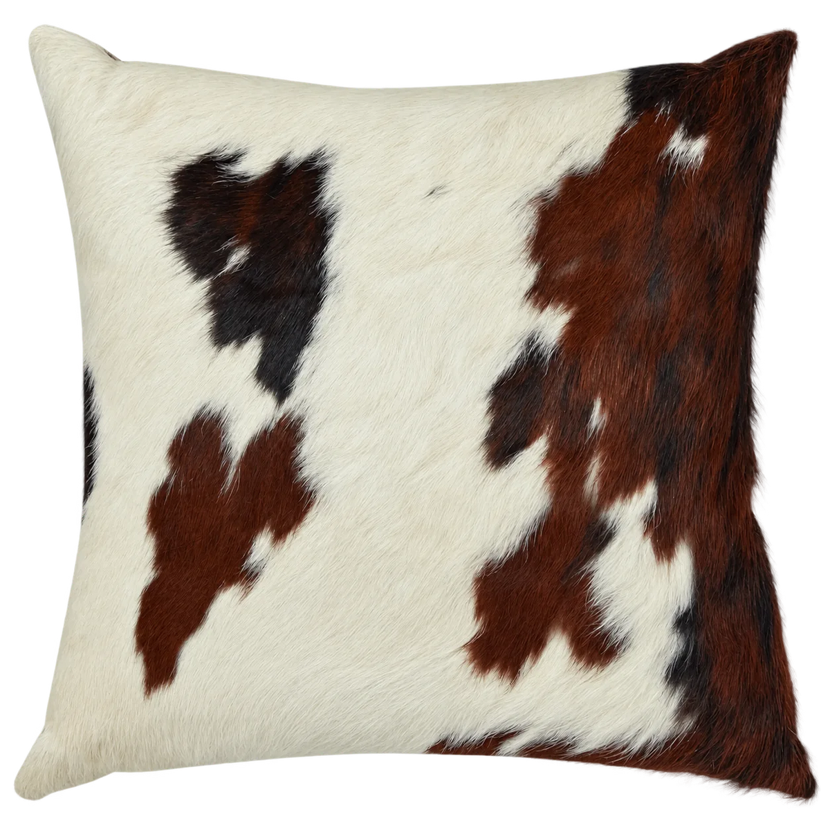 Coussin en peau de vache Terre blanche, vue du produit aux tonalités blanc et brun roux