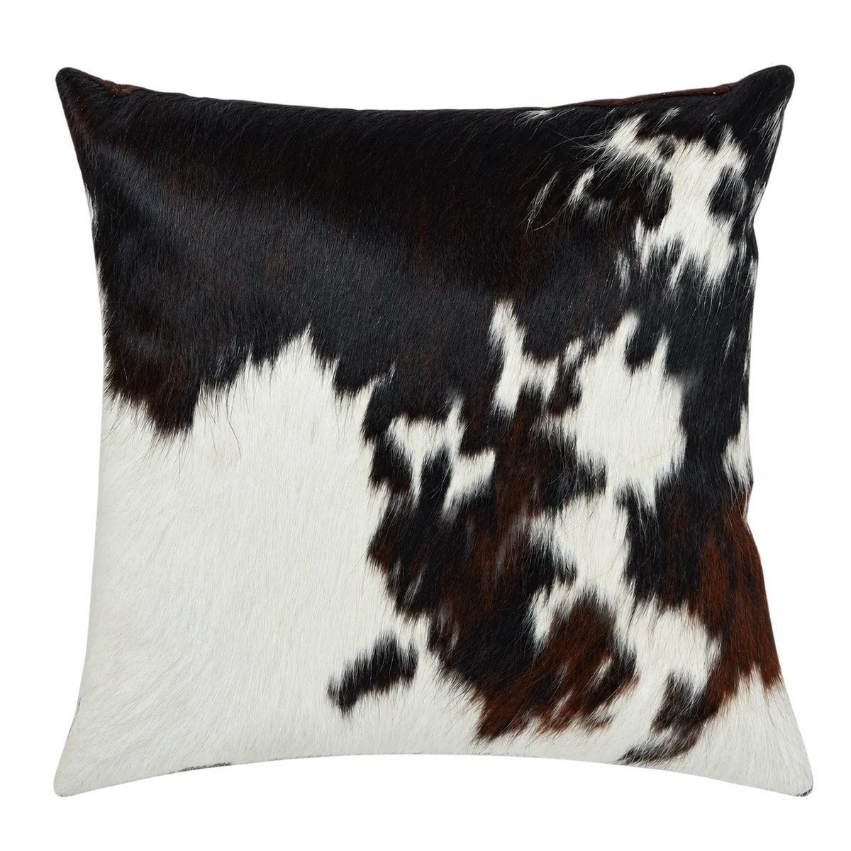 Coussin en peau de vache Clair-obscur, vue du produit aux tonalités noir, blanc et brun