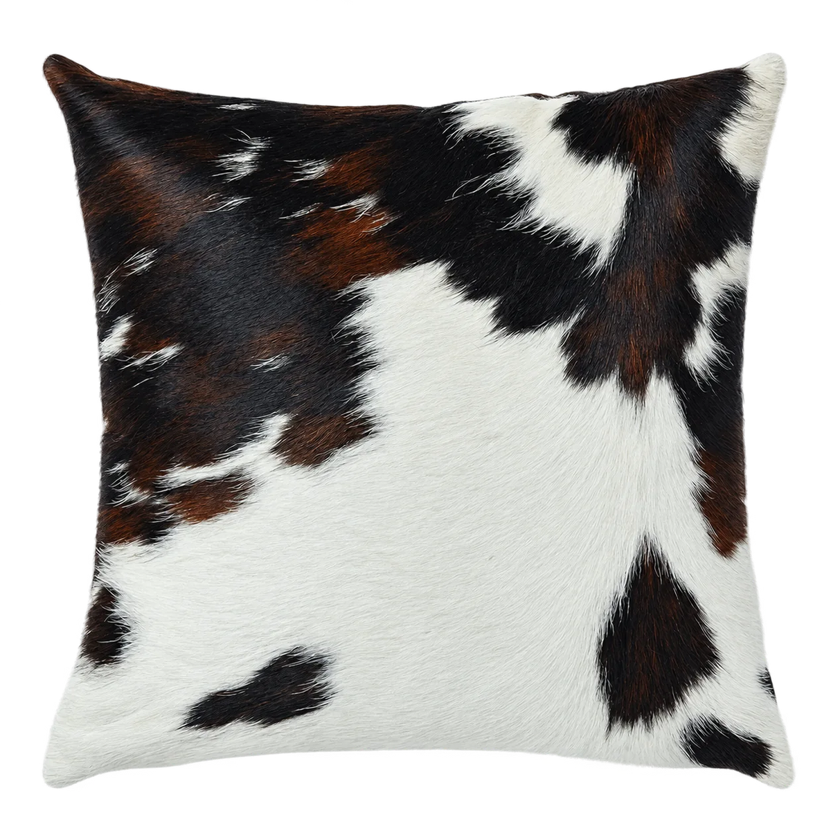 Coussin en peau de vache Encre sur ivoire, vue du produit aux tonalités ivoire, noir et brun