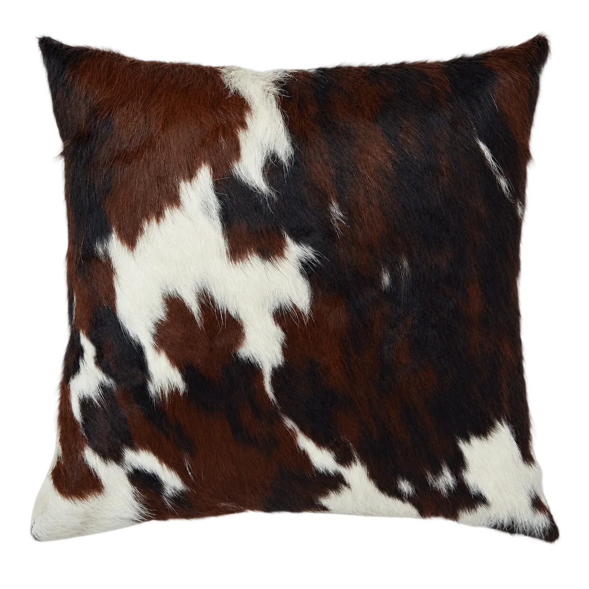 Coussin en peau de vache Sienne sombre, vue du produit aux tonalités brun roux et noir