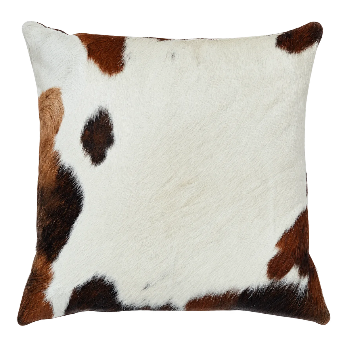 Coussin en peau de vache Ivoire brun, vue du produit aux tonalités ivoire et brun foncé