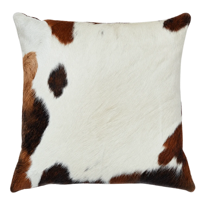 Coussin en peau de vache Ivoire brun, vue du produit aux tonalités ivoire et brun foncé