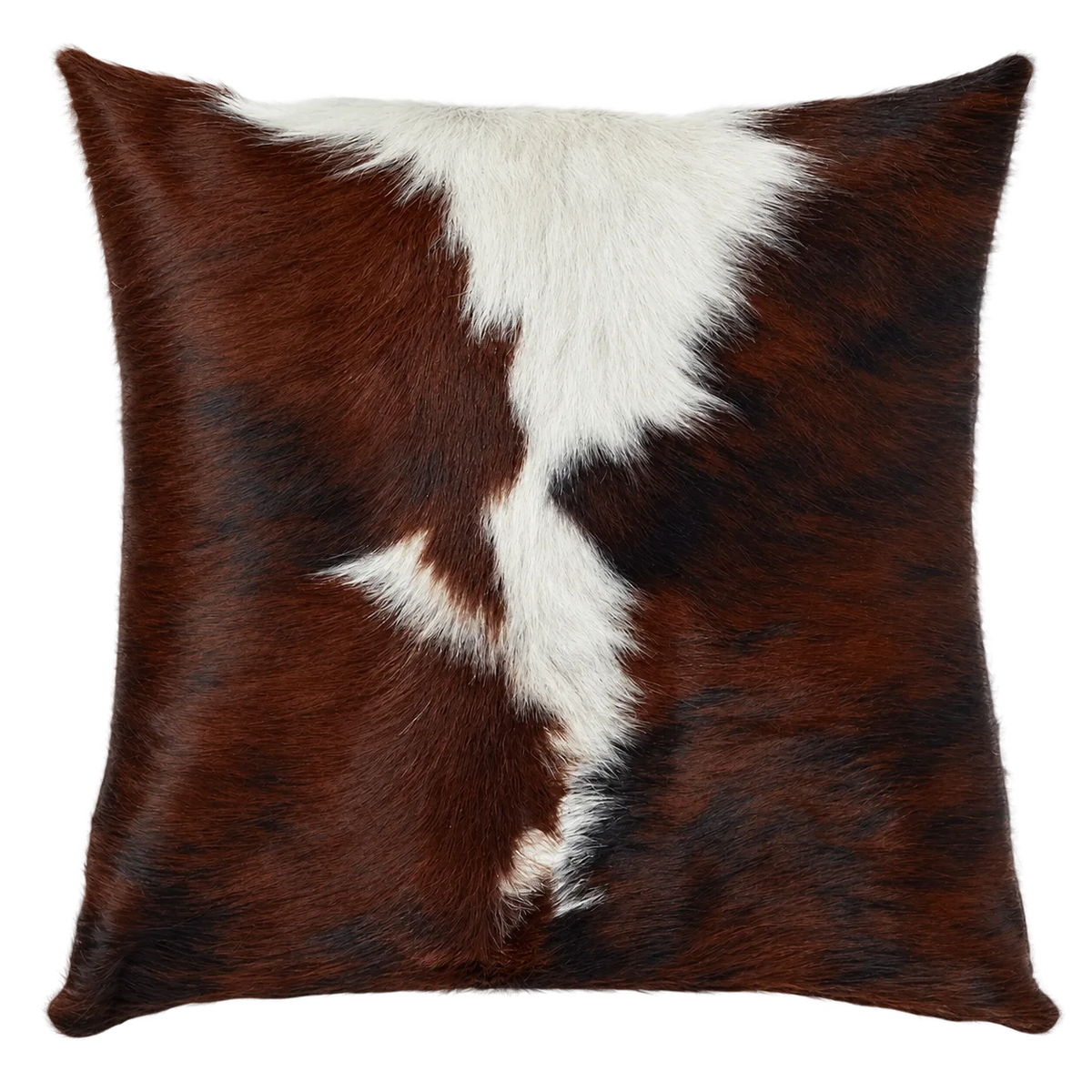 Coussin en peau de vache Terre fendue, vue du produit aux tonalités brun roux et blanc