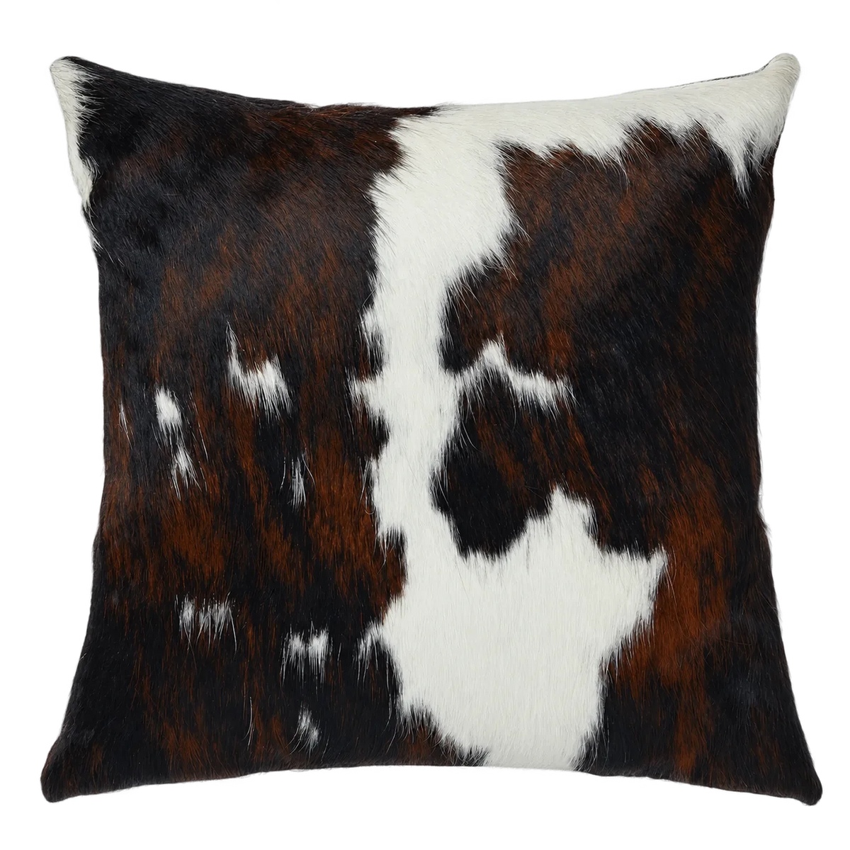 Coussin en peau de vache Encre et ivoire, vue du produit aux tonalités noir, brun et ivoire