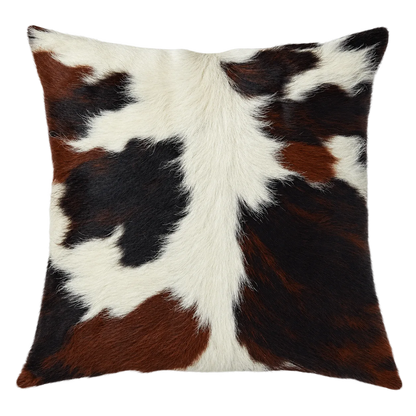 Coussin en peau de vache Contraste fauve, vue du produit aux tonalités blanc, brun et noir