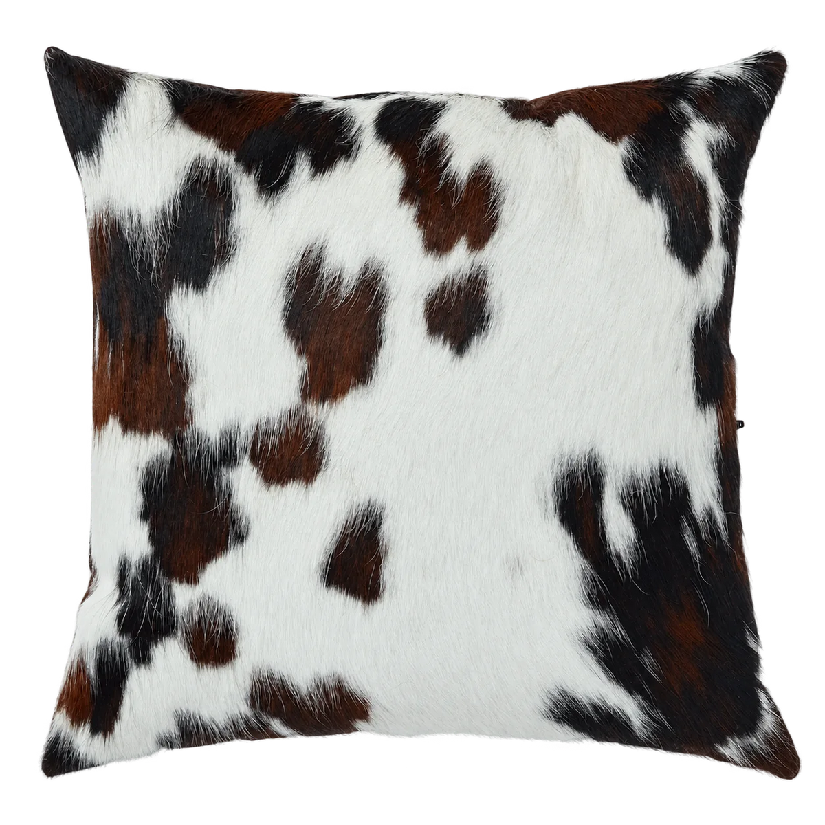 Coussin en peau de vache Granit, vue du produit aux tonalités ivoire, noir et brun