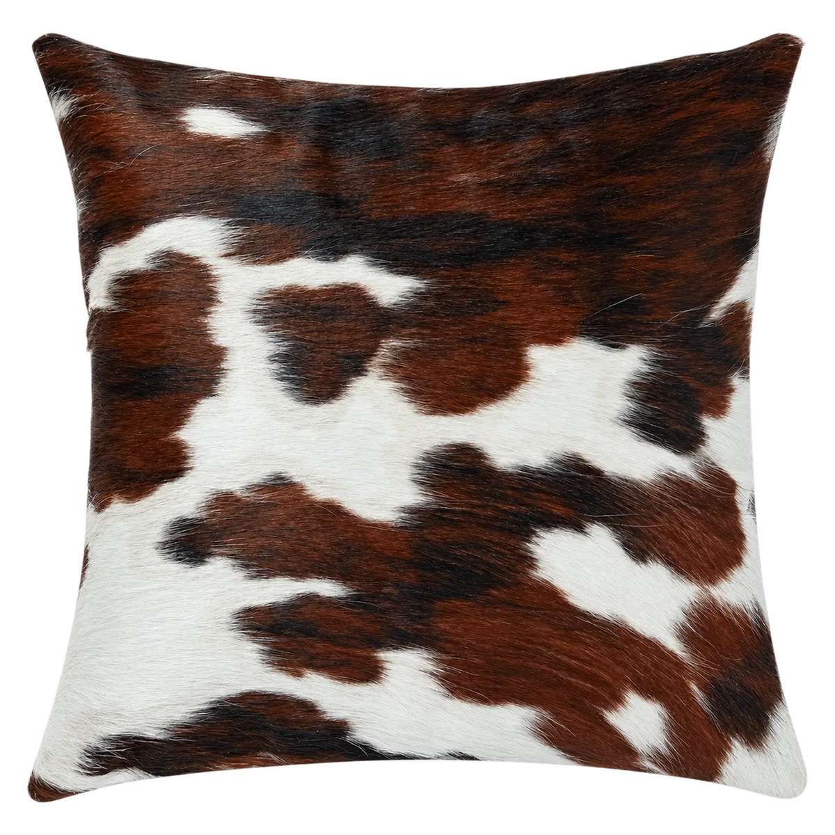 Coussin en peau de vache Marqueterie, vue du produit aux tonalités brun roux, noir et blanc